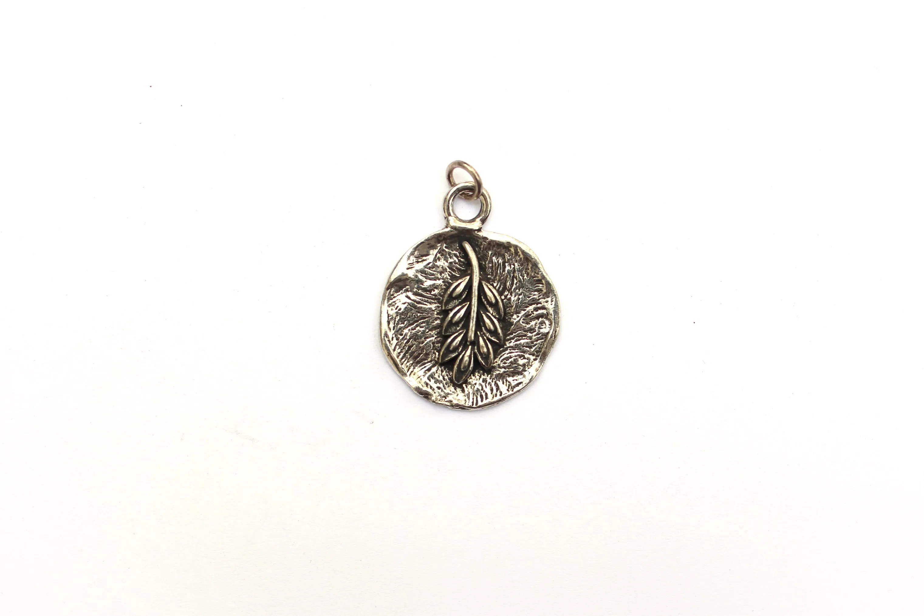 Ornamental Grass Pendant in Britannium – Nature's Whisper in Metal Form