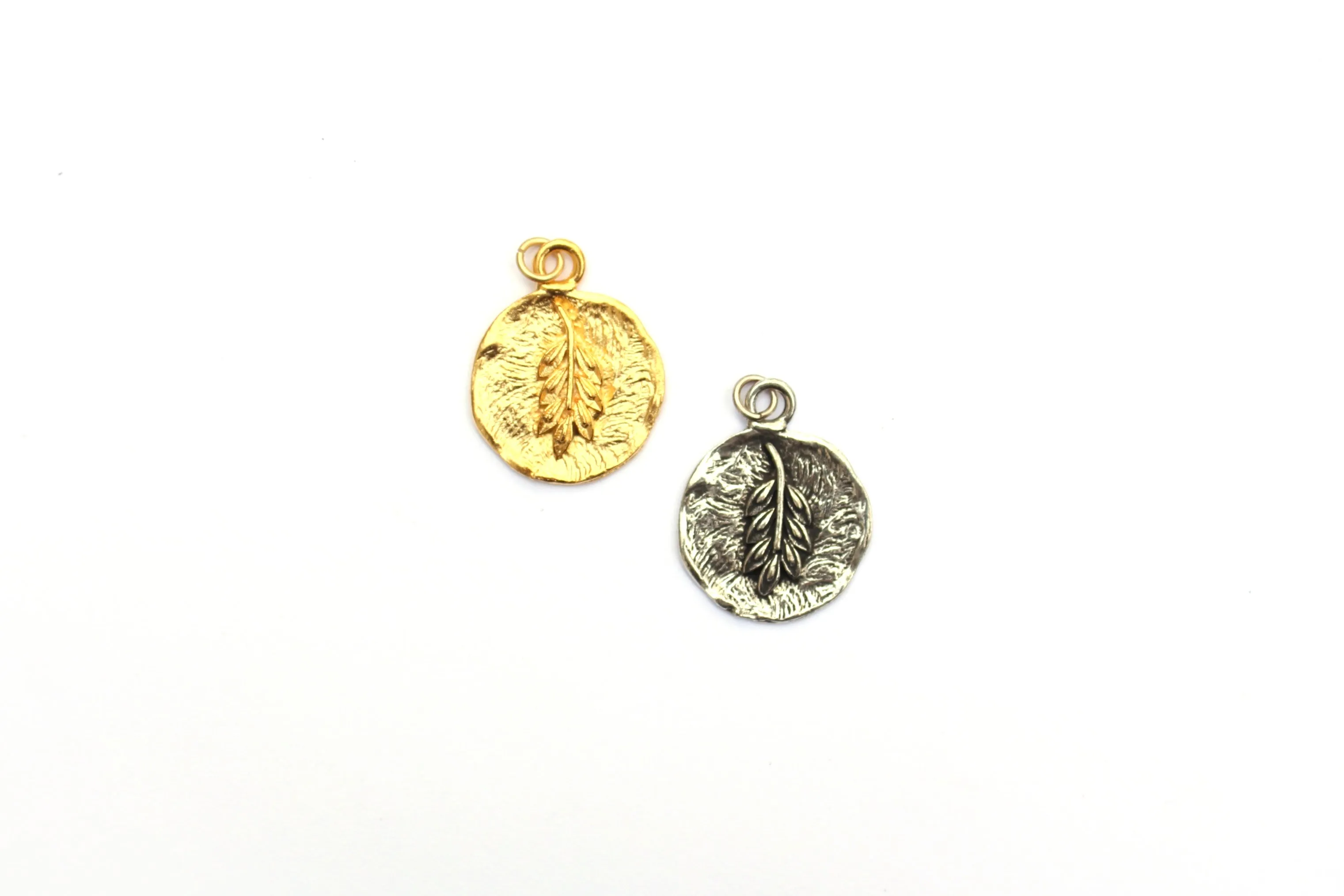 Ornamental Grass Pendant in Britannium – Nature's Whisper in Metal Form